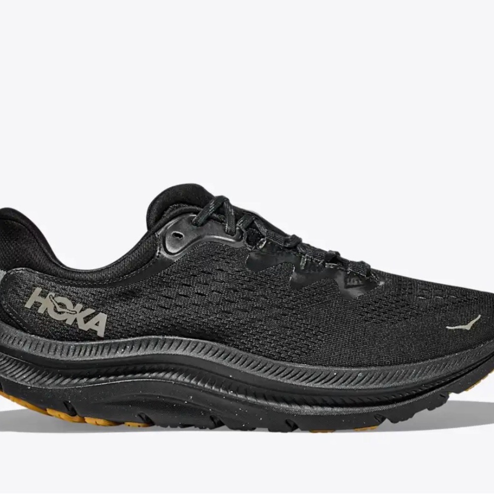 Hoka Black and Gold Athletic Shoes